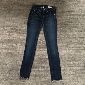 Dark wash Rag and Bone Jeans with a raw hem